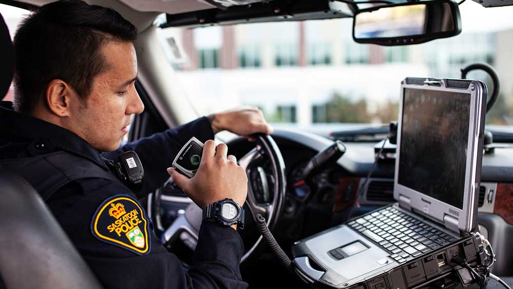 Officer on radio in car