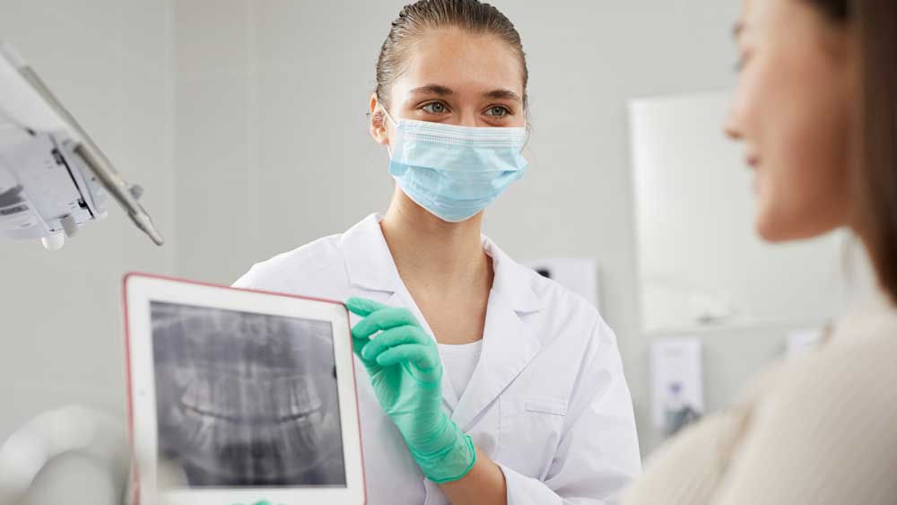 dentist showing xrays